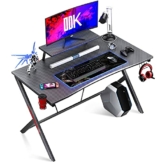ODK Gaming Tisch mit Kohlefaser 115 x 60cm, Computertisch mit Kopfhörerhaken und Getränkehalter, ergonomischer PC Gaming Tisch, Stabiler Metallrahmen, schwarz - 1